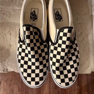 Vans Black and White Checkerboard Slip-Ons